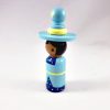 side view of blue witch peg doll standing